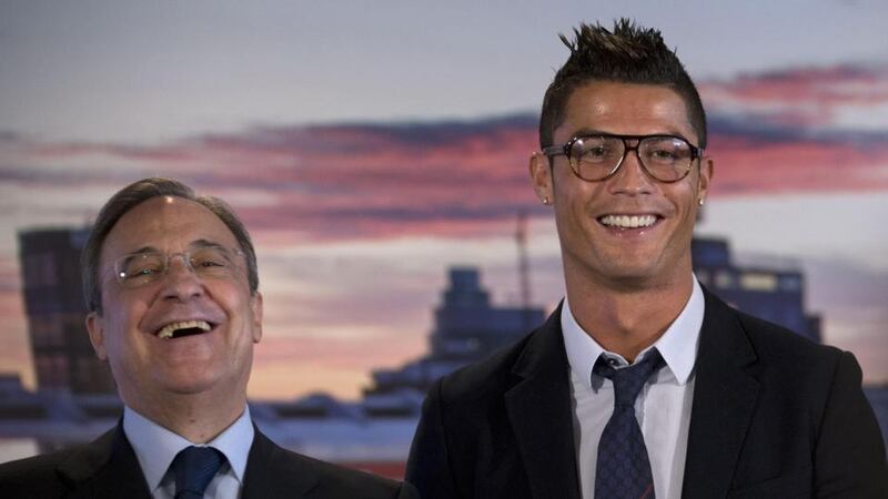 Ronaldo pictured with Real Madrid president Florentino Perez Photograph: Paul White/AP