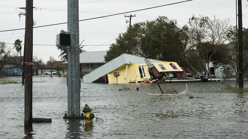 Flooding and a damaged home are seen after Hurricane Harvey hit Rockport, Texas. Photograph: Alex Scott/Bloomberg