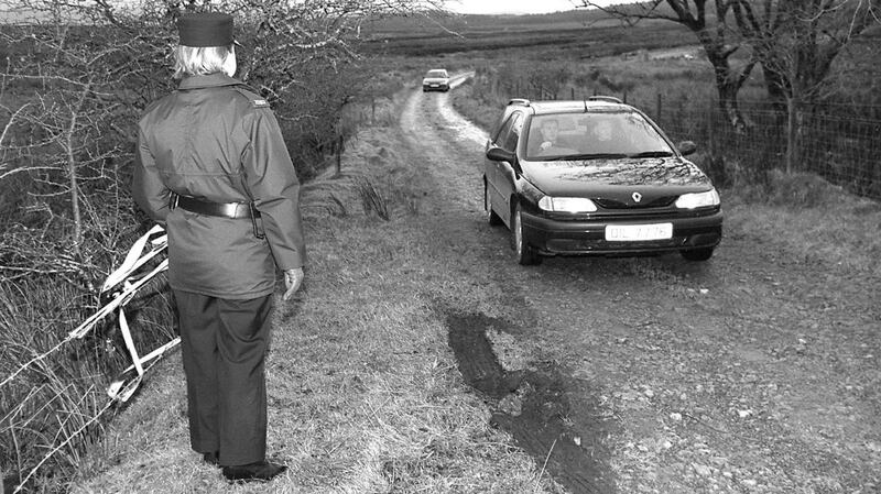 A hearse leaving the scene at Killygreen, Belcoo, in February 2001 where the remains of David Sullivan were discovered. Photograph: John McVitty/Impartial Reporter