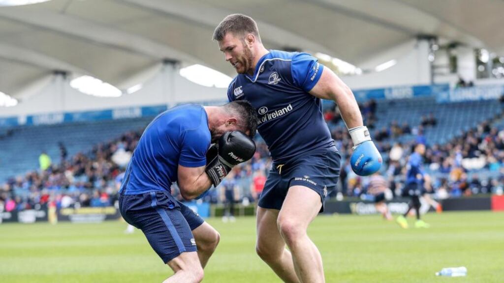 Seán O’Brien (right) with Leinster strength and conditioning coach Cillian Reardon: there will be an update on his hamstring injury later this week. Photograph: Ryan Byrne/Inpho