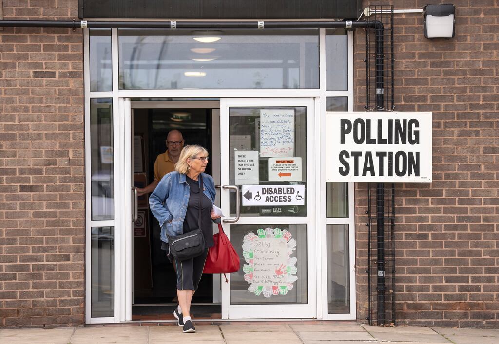 Voters leave the Selby Community Centre in North Yorkshire after casting their ballots in the Selby and Ainsty by-election. Photograph: Danny Lawson/PA Wire