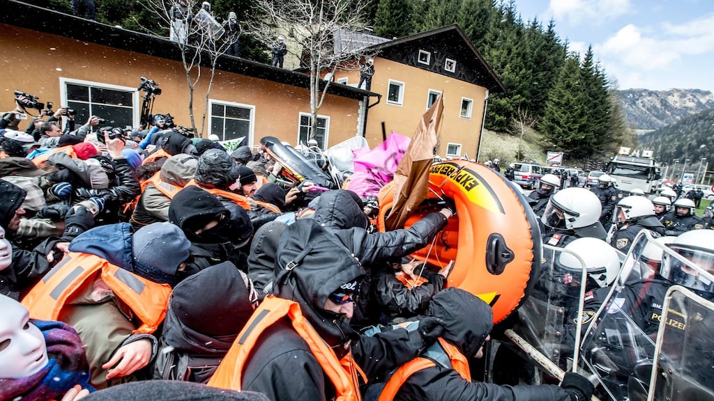 Riot police clash with protesters during a rally against the Austrian government’s planned re-introduction of border controls at the Brenner Pass, Austria. Photograph: Jan Hetfleisch/EPA