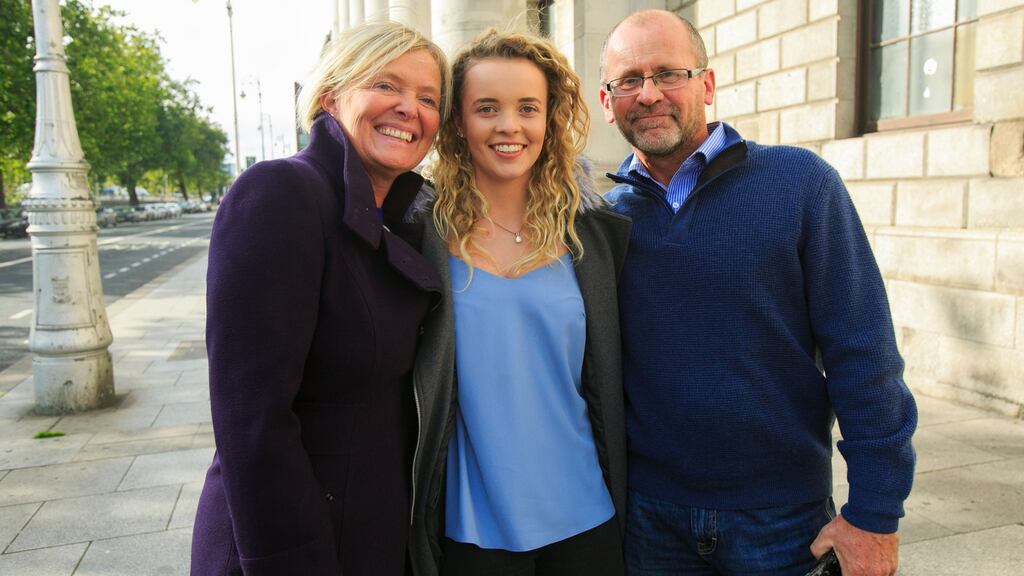 Rebecca Carter with her parents, Annemaire and Niall, all from Castlebridge in Co Wexford, leaving the High Court in Dublin this week. Photograph: Gareth Chaney/Collins