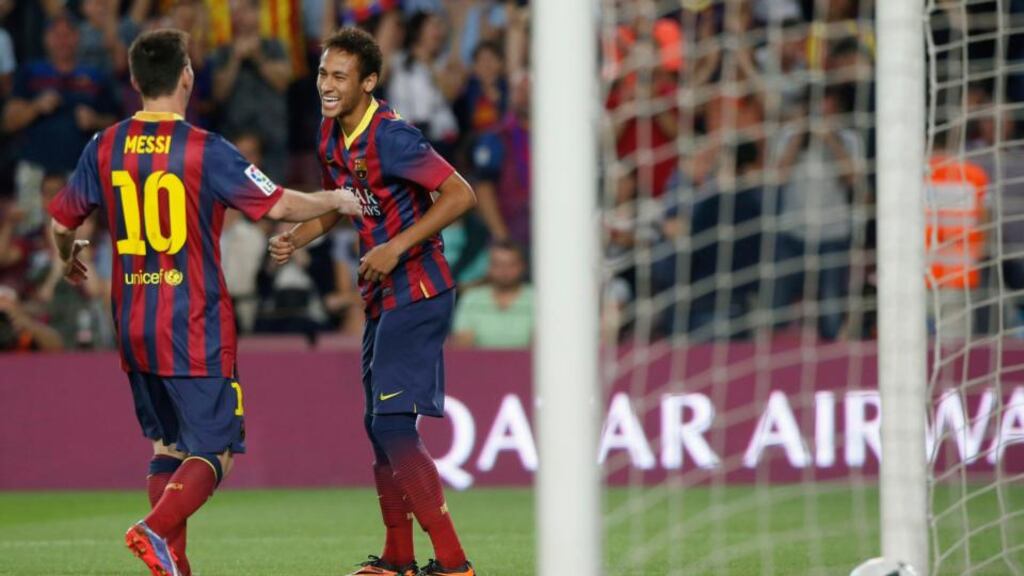 Barcelona’s Neymar and Lionel Messi (left) celebrate a goal against Real Sociedad at the Camp Nou. Photograph: Albert Gea/Reuters