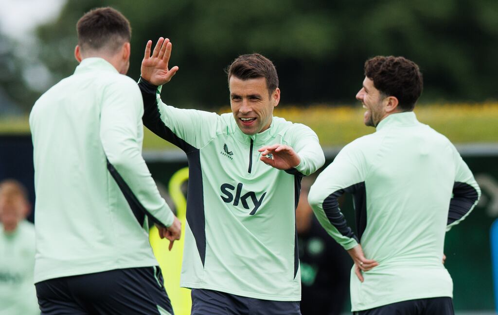 Matt Doherty, Seamus Coleman and Robbie Brady share a joke in training ahead of the game against Hungary. Photograph: Tom Maher/Inpho