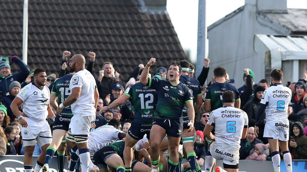 Connacht prop Denis Buckley, centre, and his team-mates celebrate a late first-half try during the victory over Montpellier at the Sportsground. Photograph: Paul Faith/AFP/Getty