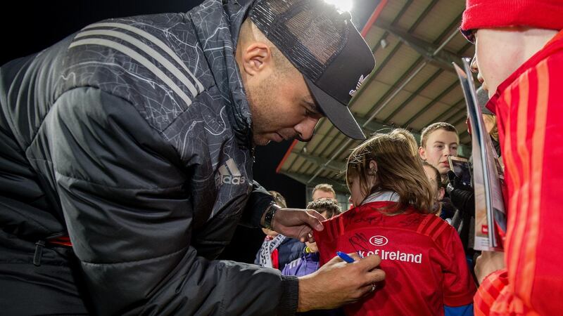 Simon Zebo signs a fan’s shirt after his final appearance at Musgrave Park. Photograph: Oisin Keniry/Inpho