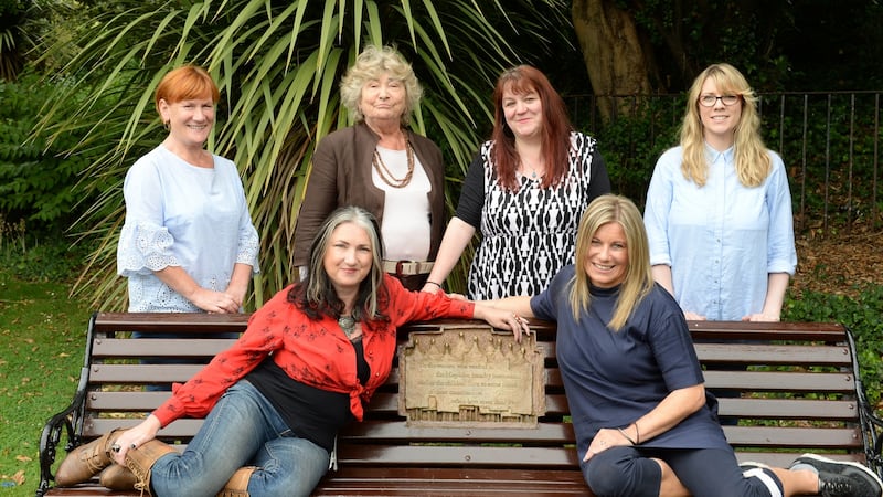 Front left: Nicole Rourke and Carol Hunt;  back row (from left): Margaret O’Sullivan, Theresa Evers, Órla McGovern and Zita Mc Gowan, the original cast of “Eclipsed”on the Magdalene bench in St Stephen’s Green. Photograph: Dara Mac Donaill