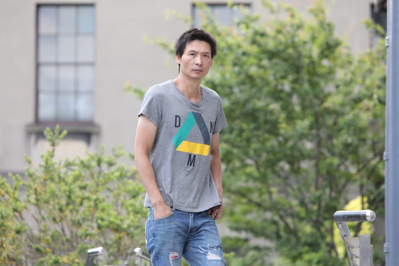 Jianfei Zheng outside the High Court in Dublin on Wednesday. Orders were made against him and his wife Xiaoxia Zheng by the court. Photograph: Collins Courts