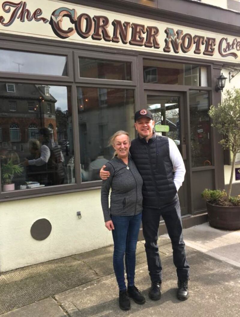 Matt Damon with Mary Caviston outside her Corner Note Café in Dalkey, Co Dublin. Photograph courtesy of Mary Caviston/New York Times