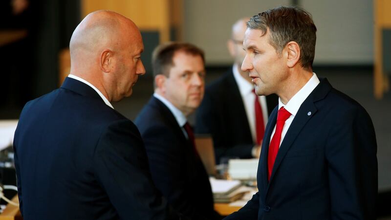 Björn Höcke (right), head of the far-right wing of the AfD, congratulates Free Democratic Party candidate Thomas Kemmerich after he was elected new Thuringia premier on Wednesday. Photograph: Hannibal Hanschke/Reuters