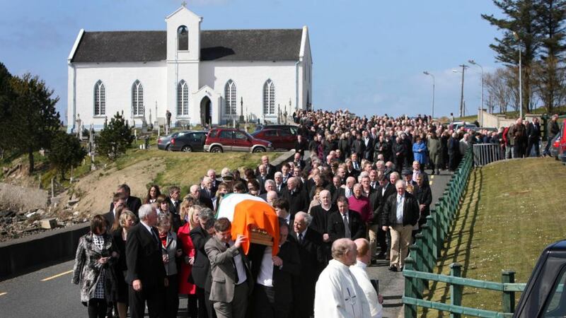 The remains of the late Harry Blaney are carried by his sons Niall and Liam from St Columba's Church, Fanad, Co Donegal yesterday.