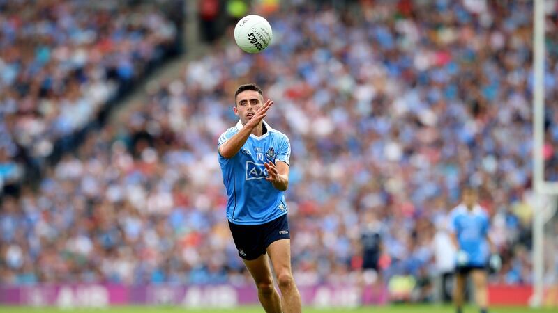 Niall Scully makes a handpass against Tyrone. Dublin made 244 passes against Tyrone. Only 54 of them were kick-passes. 78 per cent of Dublin’s passes were made with the hand. Photograph: Ryan Byrne/Inpho