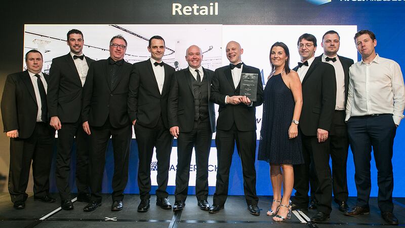 Richard Flood, Managing Director, Castlerock presents the Fit Out Project of the Year – Retail award to the McCabe McGinn, Brown Thomas & Fiontar Safety Management project teams
