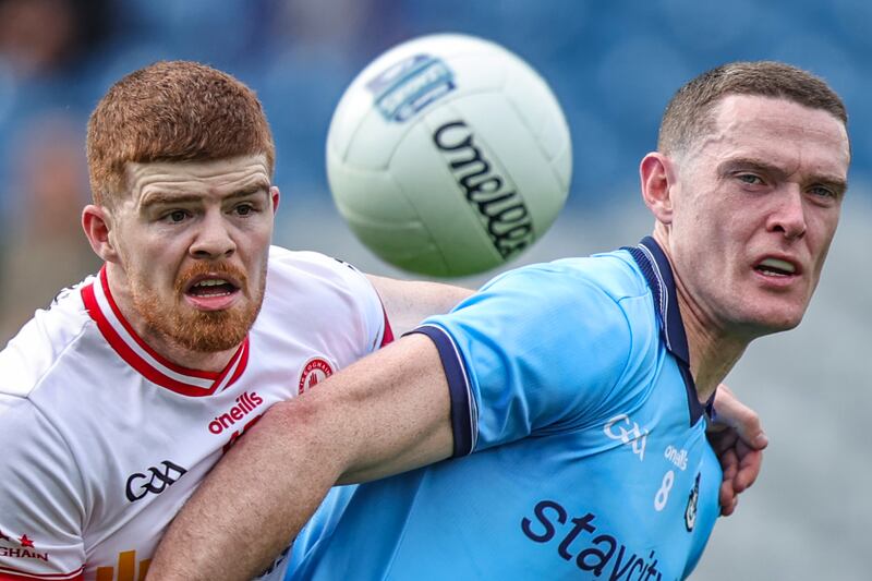 Tyrone's Cathal McShane challenges Dublin's Brian Fenton during the
Allianz Football League Division One game at Croke Park. Photograph: Tom Maher/Inpho