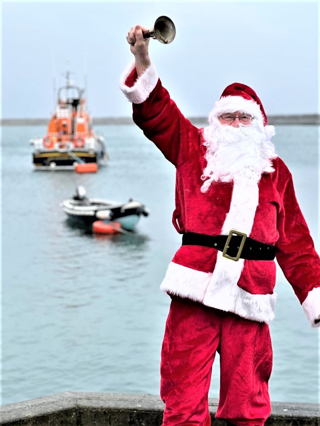 Santa welcoming guests to the Dun  Laoghaire RNLI first annual Jingle Mingle Christmas shopping spree in the lifeboat station on the east pier. The  event raised €2,500 for the charity