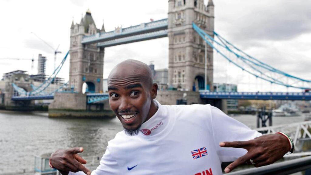 Britain’s Mo Farah poses for photographers in front of Tower Bridge ahead of his the London Marathon, which takes place tomorrow. It will be Farah’s first competitive run at the distance. Photogrtaph: Facundo Arrizabalaga/EPA