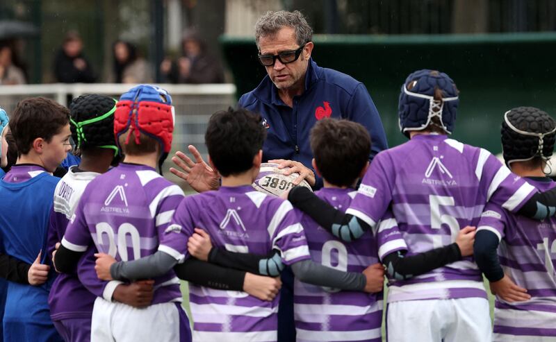 France head coach Fabien Galthié passing on some knowledge to young players eager to learn. Photograph: Franck Fife/AFP via Getty Images