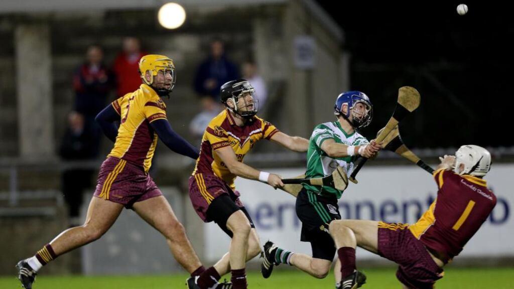 Lucan Sarsfields’ Paddy Ward scores his side’s opening goal in the sixth minute past goalkeeper Stephen Chester of Craobh Chiaráin. Photograph: James Crombie/Inpho