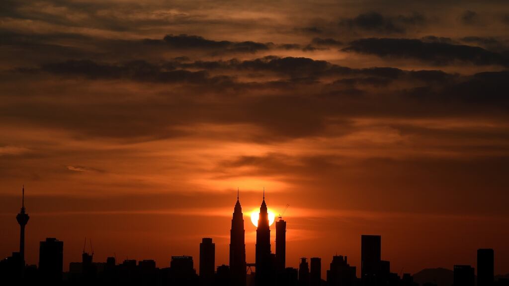 Malaysia’s landmark Petronas Twin towers: the country’s estimated 20 million Malays, seven million Chinese, two million Indians and other communities are represented in competing political coalitions organised mainly on communal lines, Photograph: Manan Vatsyayana/AFP/Getty Images