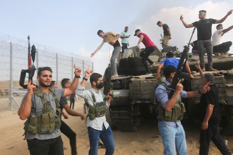 Some sources say as many as 3,000 Palestinians poured through the border fence, including members of Palestinian Islamic Jihad and civilians who were emboldened by the slow response of Israeli security forces. Photograph: Hatem Ali/AP