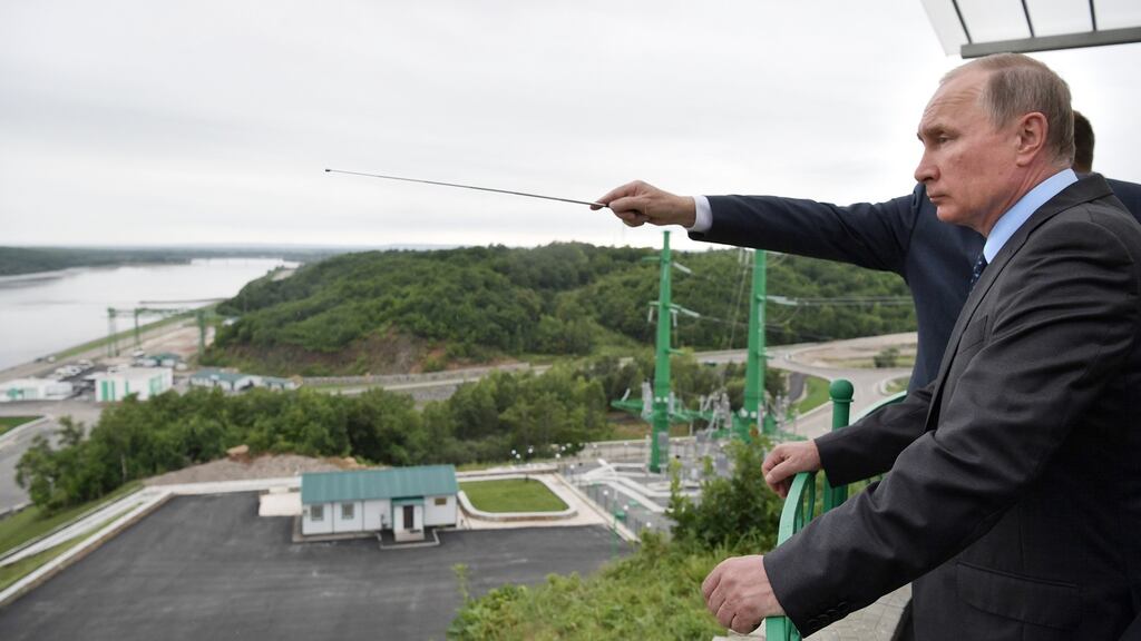 Russian president Vladimir Putin visits the Nizhne-Bureiskaya Hydroelectric Power Plant on the Bureya river near the Novobureisky, about 175km east of the city of Blagoveshchensk in Amur region. Photograph: Alexey Nikolsky/Sputnik/ EPA