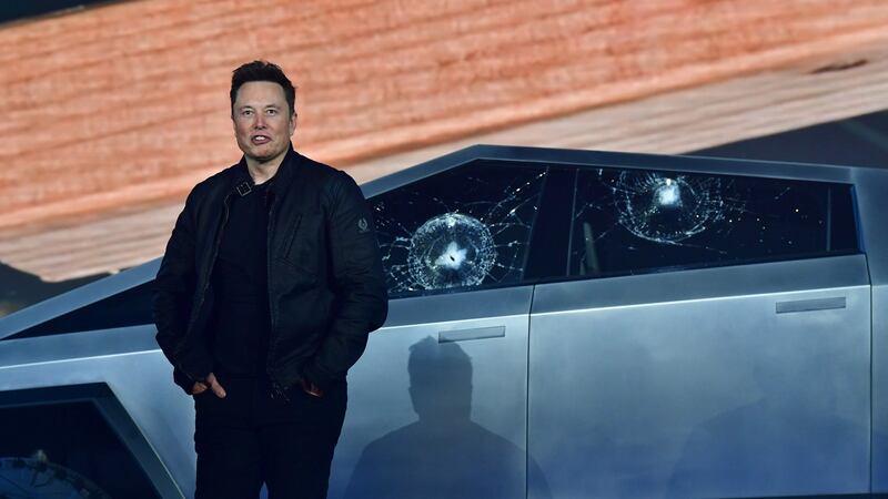 Tesla co-founder and CEO Elon Musk stands in front of the shattered windows of the newly unveiled all-electric battery-powered Tesla’s Cybertruck at Tesla Design Center in Hawthorne, California. Photo Frederic J Brown/AFP/Getty