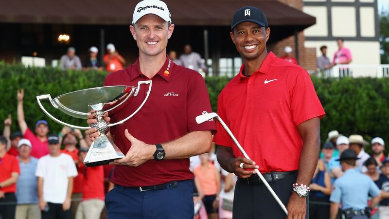Tour Championship winner Tiger Woods with FedEx Cup winner Justin Rose. Photograph: Kevin C. Cox/Getty