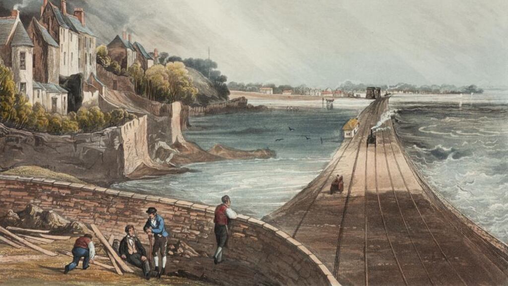 Rock of the bay: a Dublin and Kingstown locomotive approaches Blackrock, in Co Dublin, in 1834; Dargan’s stonework survives on the line. Image: SSPL/Getty