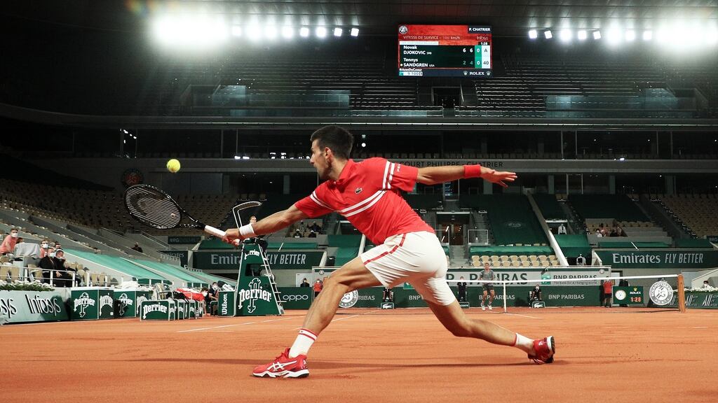 Novak Djokovic hits a backhand during the French Open first-round match against Tennys Sandgren at Roland Garros. Photograph: Christophe Petit Tesson/EPA