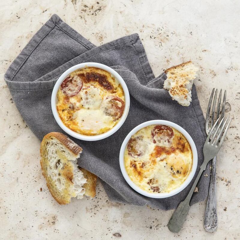 Baked eggs with chorizo, cream and Parmesan. Photograph: Harry Weir