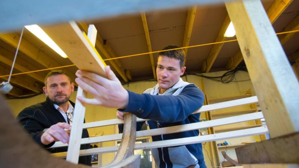 “A lot of them never had anyone believe they could do anything.” Stephen Plunkett, chief executive of U-Casadh, and Johnny Delaney, who attends the project. Photograph: Patrick Browne