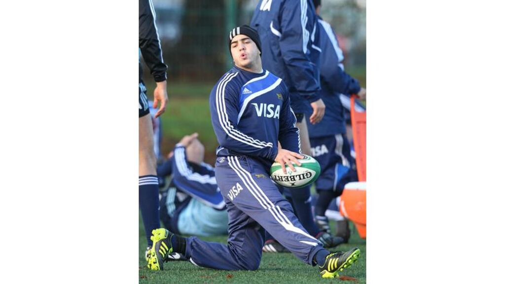 Argentina's Horacio Agulla stretches during yesterday's training session at UCD. The World Cup winger will start against Ireland on Sunday (Photograph: Lorraine O'Sullivan/Inpho)