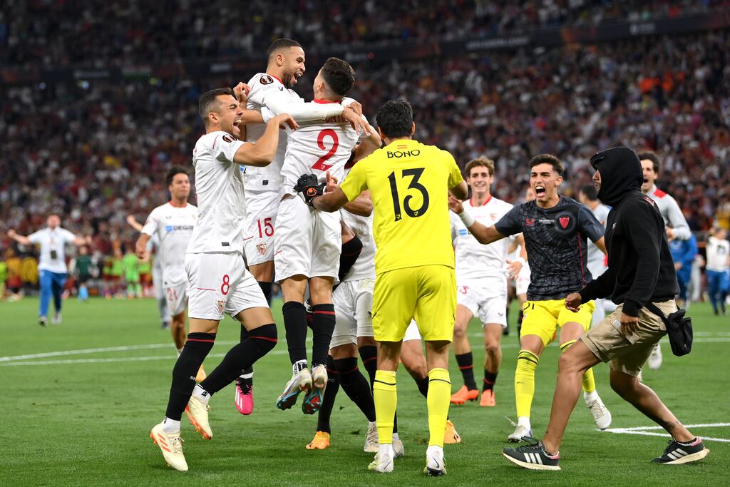 Sevilla FC players celebrate after the team's victory in the penalty shoot out in Budapest, Hungary. Photograph: Justin Setterfield/Getty