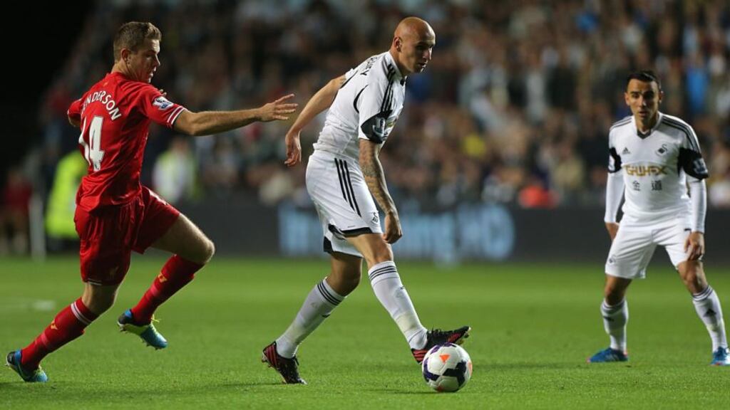 Jonjo Shelvey’s poor back pass allowed Liverpool’s Daniel Sturridge to equalise at the Liberty Stadium. Photograph: Nick Potts/PA Wire.