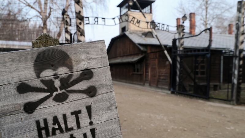 The main entrance gate of the former Auschwitz camp. Photograph: Andrzej Grygiel/EPA