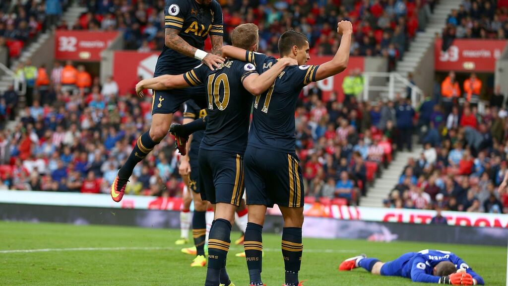 Tottenham Hotspur’s Harry Kane celebrates scoring his sides fourth goal of the match with team mates in their 4-0 win over Stoke City. Photo: Dave Thompson/PA