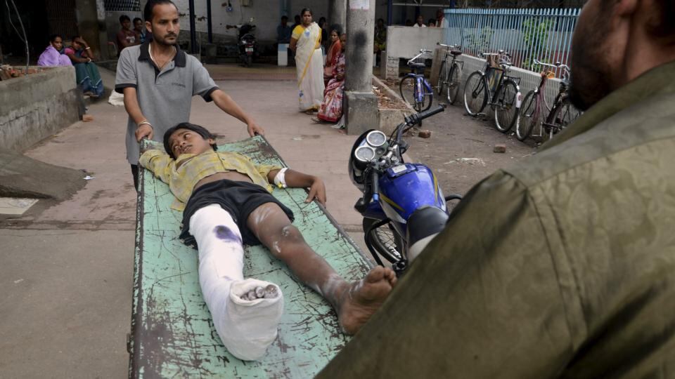 An injured boy is taken to a ward inside a hospital after an earthquake in Siliguri, India. At least two people were killed on Saturday when the earthquake measuring 7.9 magnitude struck Nepal and parts of northern India, authorities in both countries said. REUTERS/Stringer
