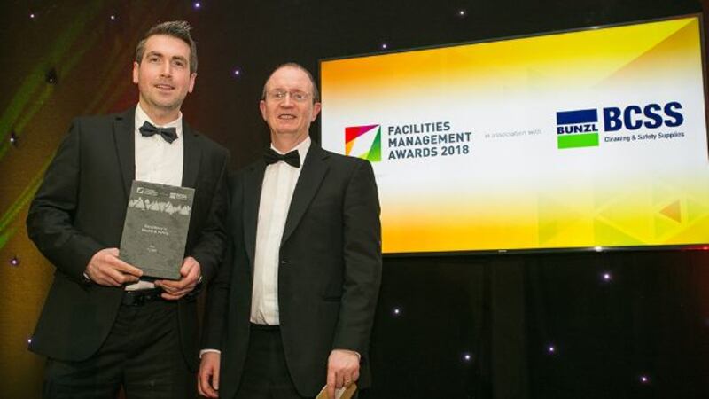 Pat Gaughan, Managing Director, Advanced Workplace Solutions presents the Excellence in Health & Safety award to Declan Kearney, Flynn