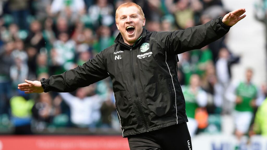 Hibernian manager Neil Lennon celebrating in front of Rangers fans after his team scored a late equalising goal during a league match in May 2018. Photograph: Jane Barlow/PA Wire