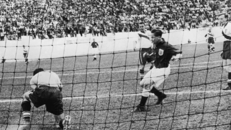 American goalkeeper Frank Borghi saves in front of Tom Finney, during his team’s shock win over England. File photograph: Getty Images