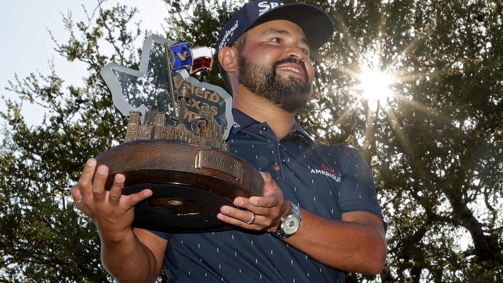 JJ Spaun celebrates with the trophy after winning the Valero Texas Open at TPC San Antonio. Photograph: Stacy Revere/Getty