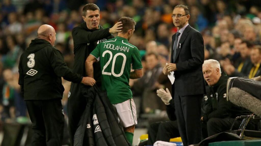 Roy Keane congratulates Wes Hoolahan after coming off. Photograph: Ryan Byrne/Inpho
