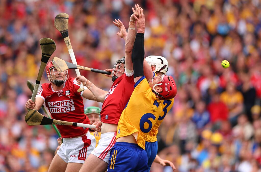 Cork’s Brian Hayes and Darragh Fitzgibbon with John Conlon and Conor Cleary of Clare during the All-Ireland SHC final. Photograph: James Crombie/Inpho