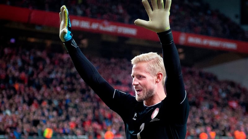 Denmark’s goalkeeper Kasper Schmeichel celebrates with supporters after the match. Photograph: Liselotte Sabroe/Ritzau Scanpix/AFP via Getty Images