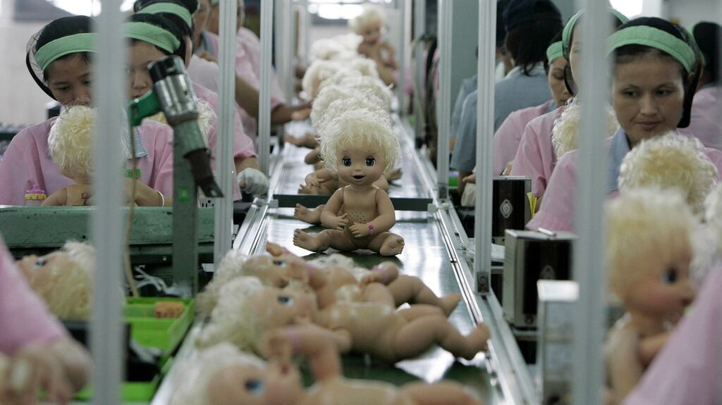 A toy factory in Panyu, China. South Carolina low-skill workers are fighting robots at home and China abroad. The battle is not going well. Photograph: Reuters