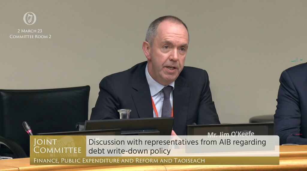 Jim O'Keeffe, managing director of AIB appearing before the Oireachtas finance committee to discuss debt write-down policy. Photograph: PA from Oieachtas TV