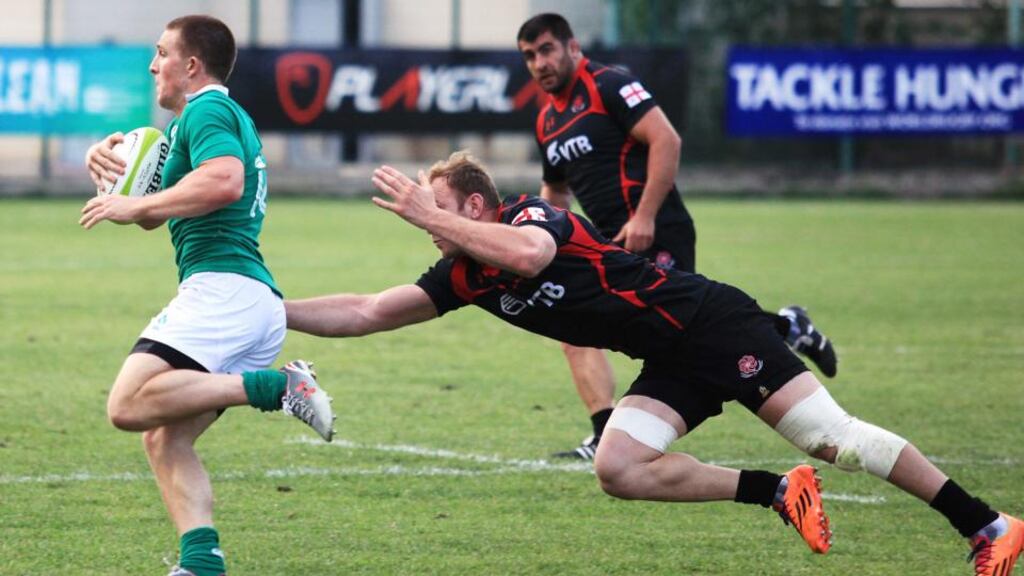 Andrew Conway makes a break for Emerging Ireland against Georia in Tbilisi. Photo: GRU/Inpho