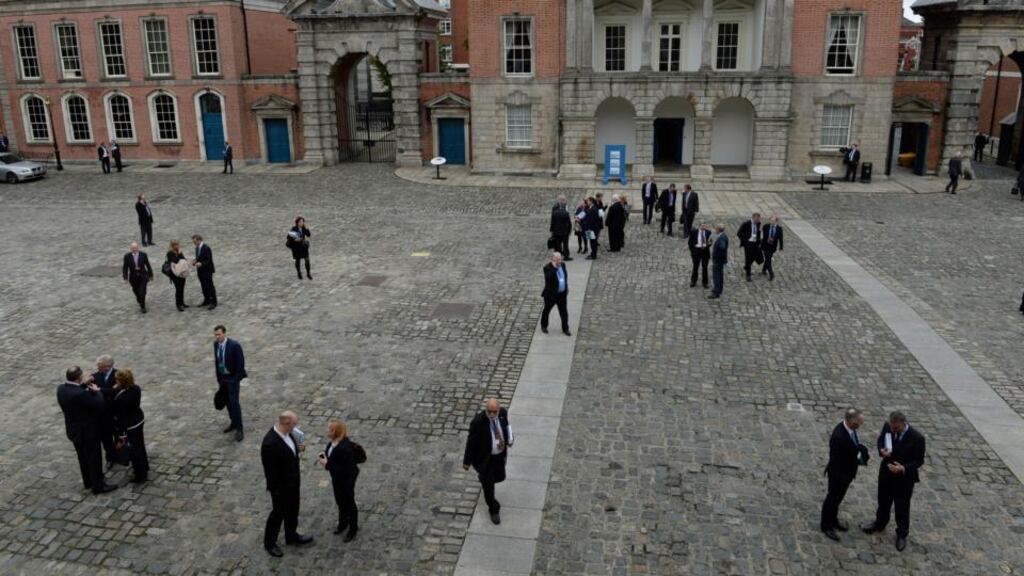 Delegates mix in the yard at Dublin Castle during a break at the Global Irish Economic Forum yesterday. Photograph: Frank Miller
