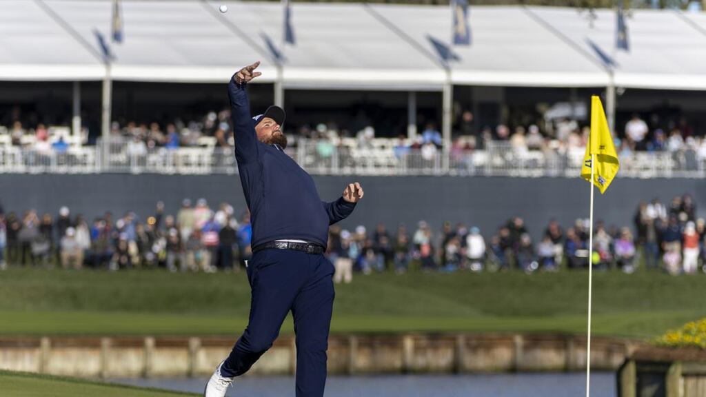 Shane Lowry  tosses his ball into the crowd after making a hole-in-one on the 17th hole during the third round of The Players Championship  at TPC Sawgrass in Ponte Vedra Beach, Florida. Photograph: David Rosenblum/Icon Sportswire via Getty Images